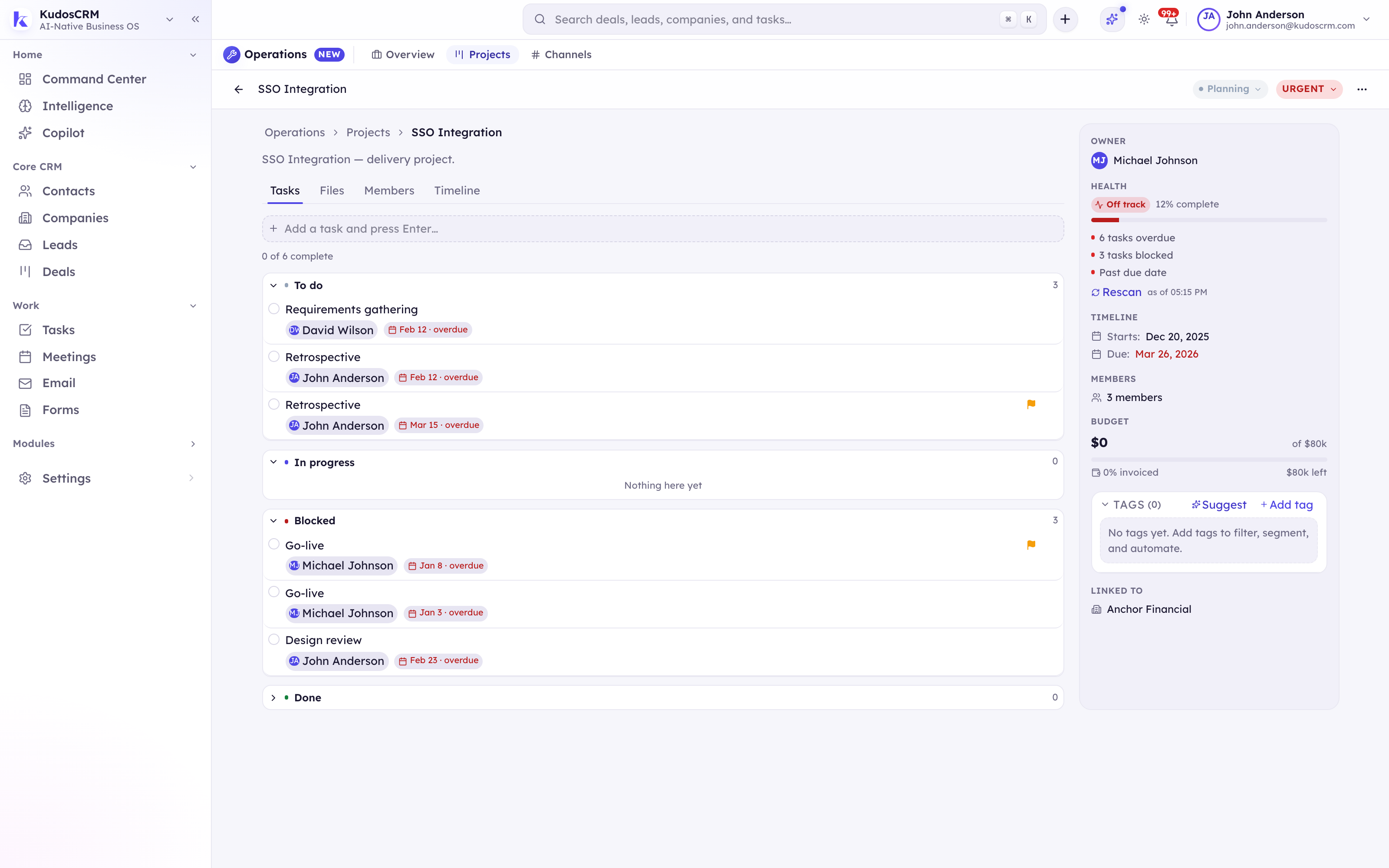 A KudosCRM project health header with the Risk Radar — good, at-risk or off-track with reasons